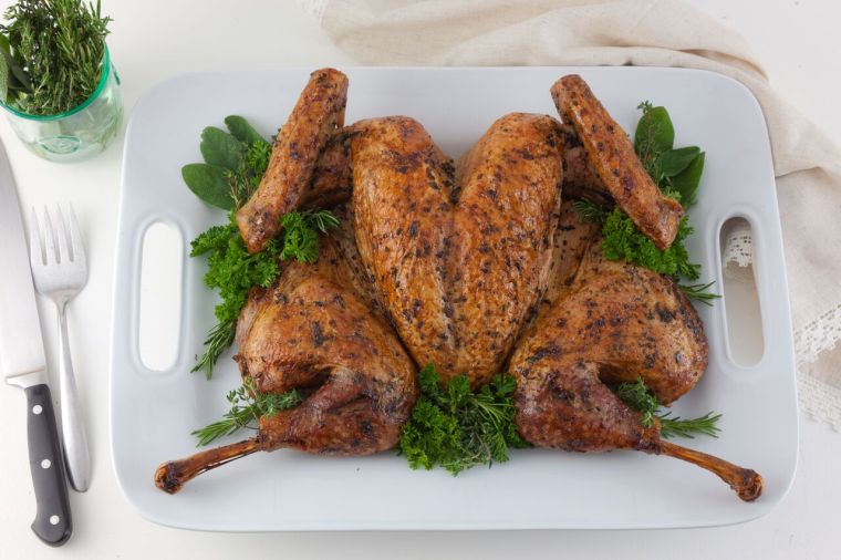 spatchcock-turkey-10-roasted-on-plate-photo-by-kelly-cline-for-allrecipes